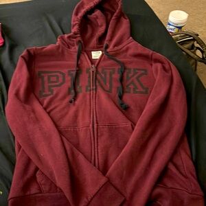 Pink/Victoria secrete. Size medium barely worn. No stains or rips,zipper works.